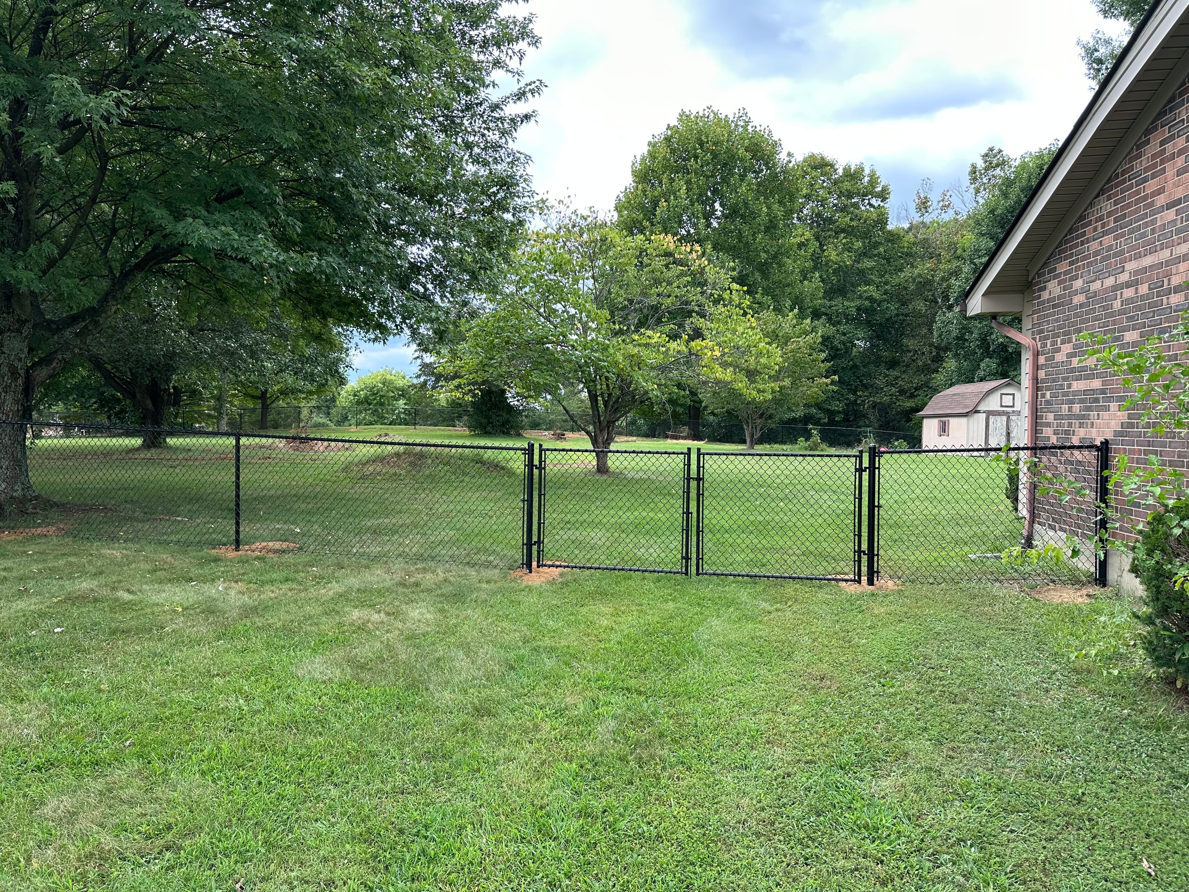 Durable black vinyl chain link fencing residential Louisville KY