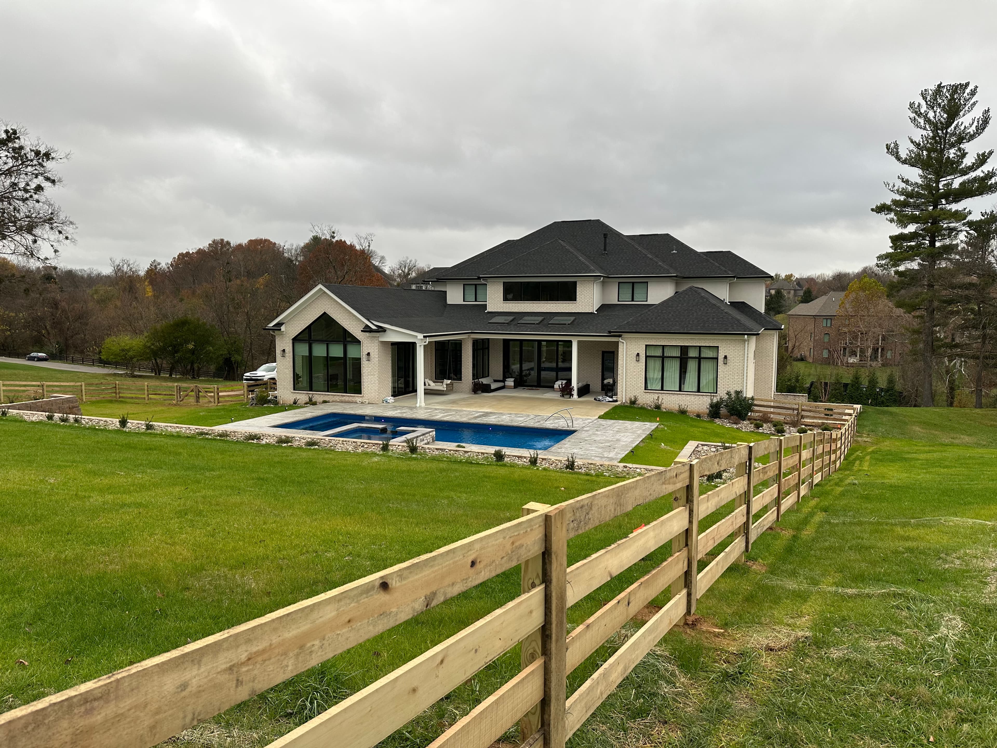 Premium four board fence installation luxury residential Louisville